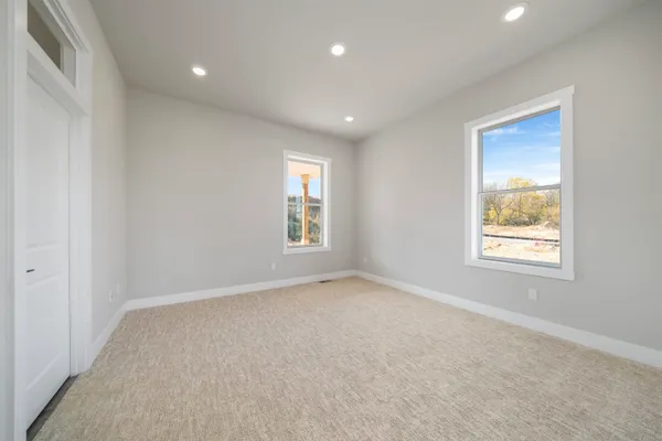 an empty room with windows