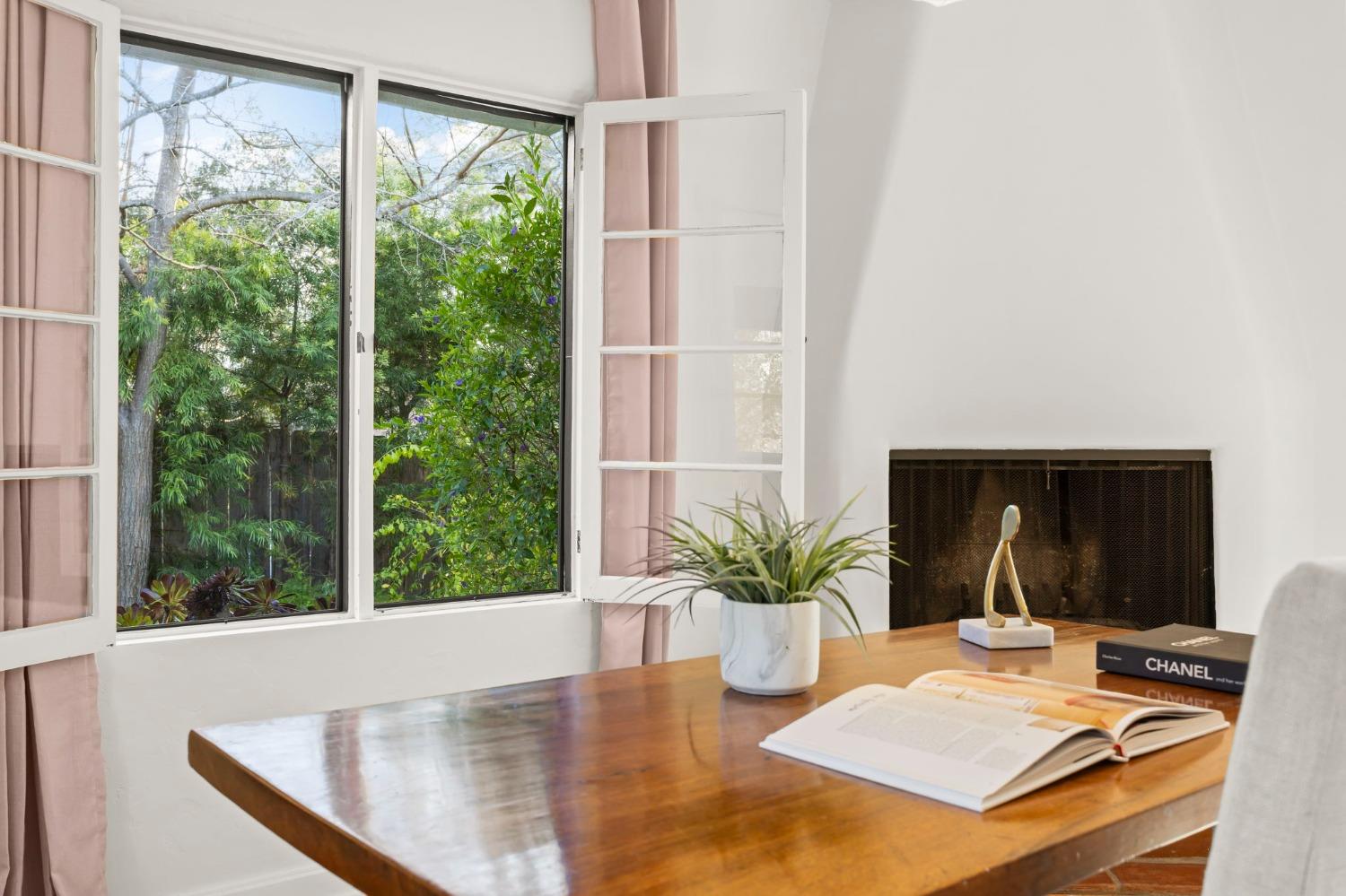 105 Foothill Road Ojai, CA 93023 - Photo 28 of 38 a view of a living room with furniture and a potted plant