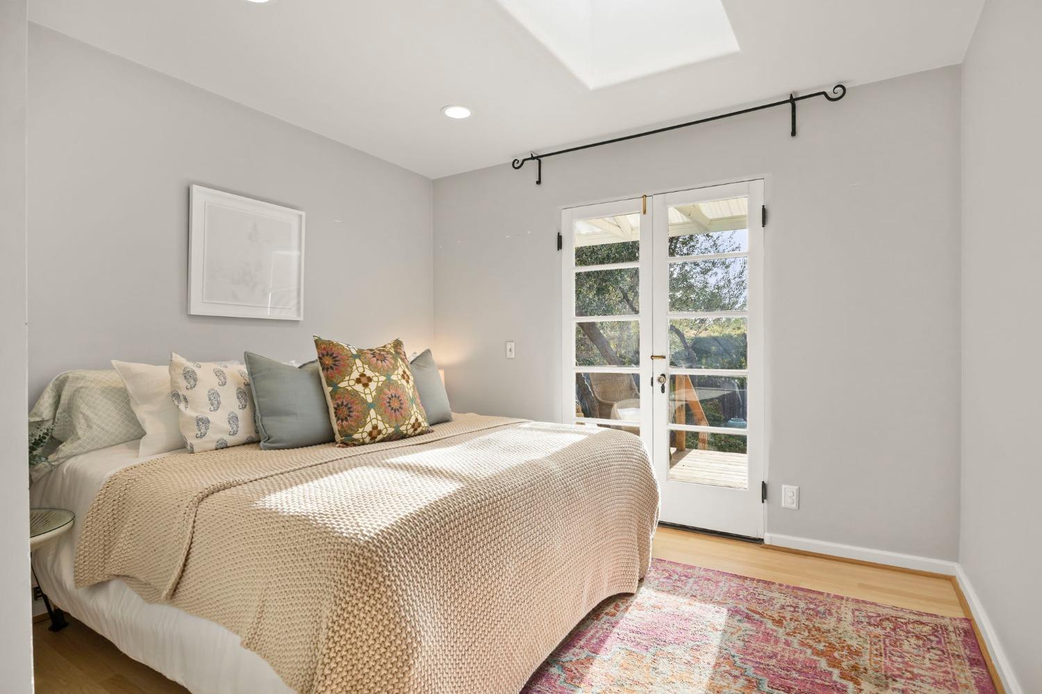 105 Foothill Road Ojai, CA 93023 - Photo 29 of 38 a bedroom with a large bed and a window