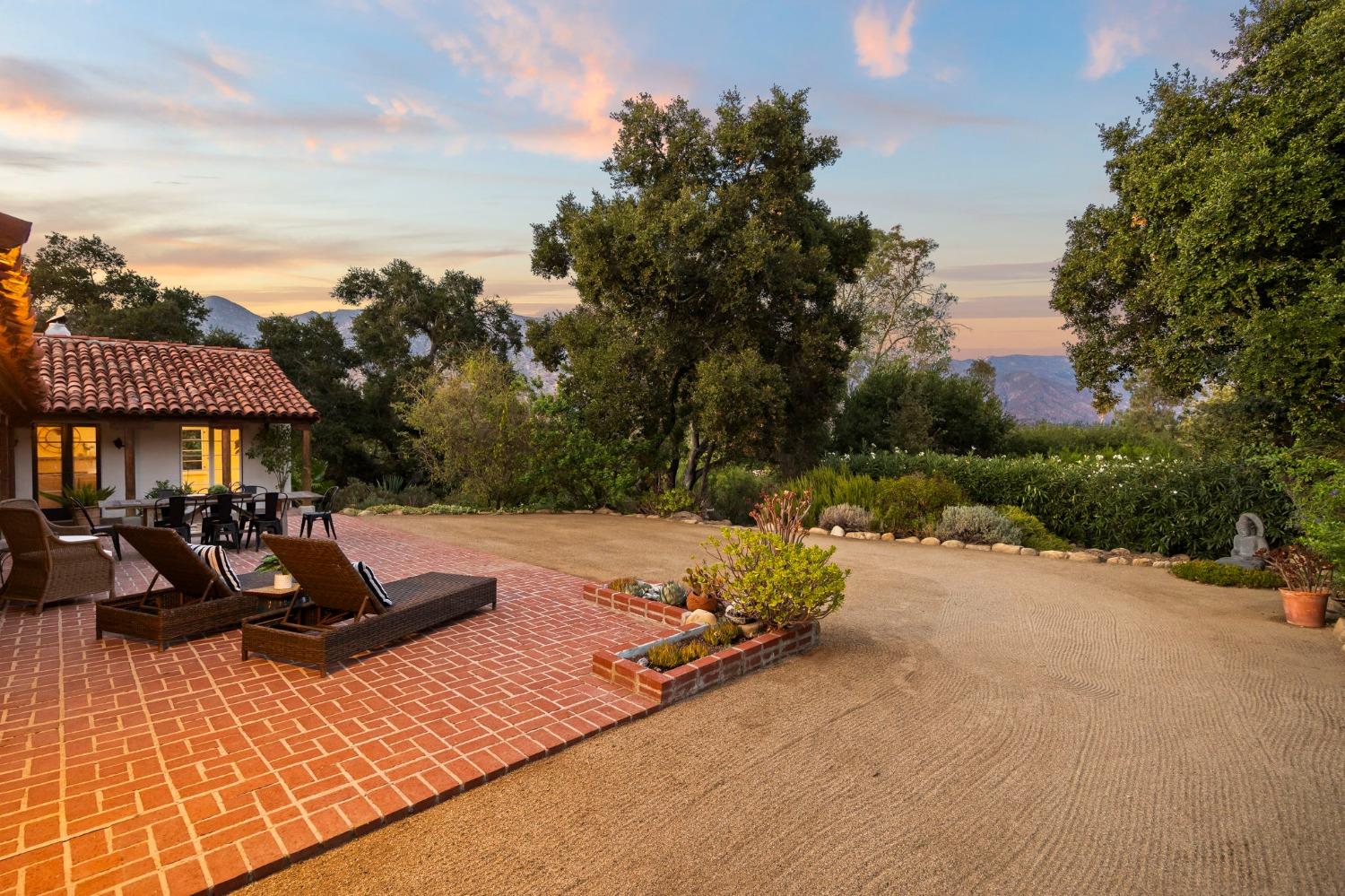 105 Foothill Road Ojai, CA 93023 - Photo 6 of 38 a view of a house with backyard and sitting area