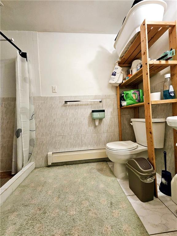 1820 73rd Street, Unit 1A Brooklyn, NY 11204 - Photo 9 of 20 a bathroom with a toilet and a shower