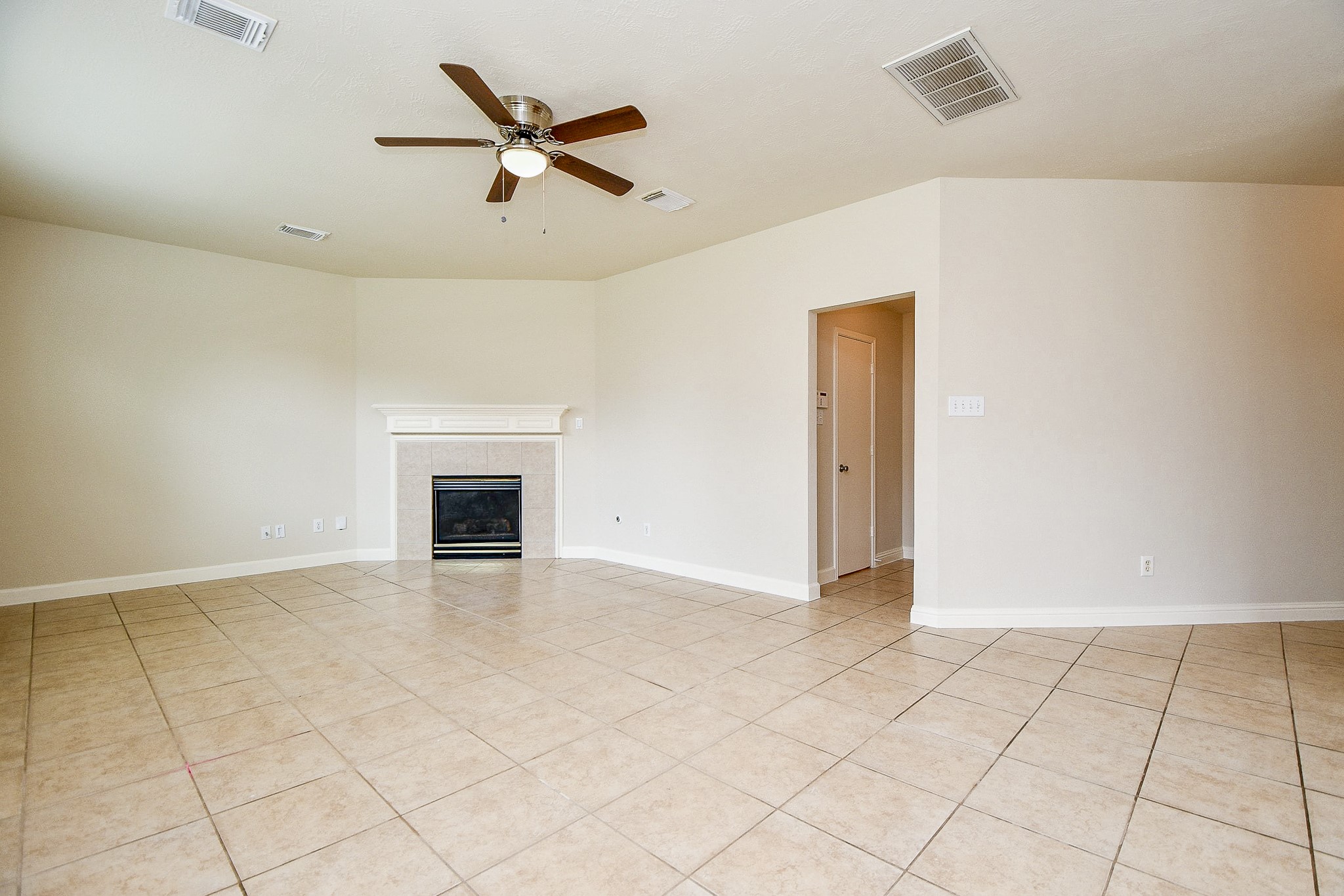 2707 Silk Tree Lane Katy, TX 77449 - Photo 12 of 31 an empty room with fan and windows