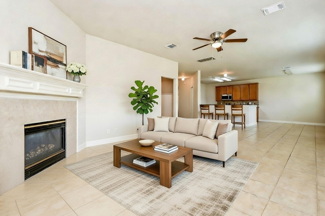 2707 Silk Tree Lane Katy, TX 77449 - Photo 14 of 31 a living room with furniture and a fireplace