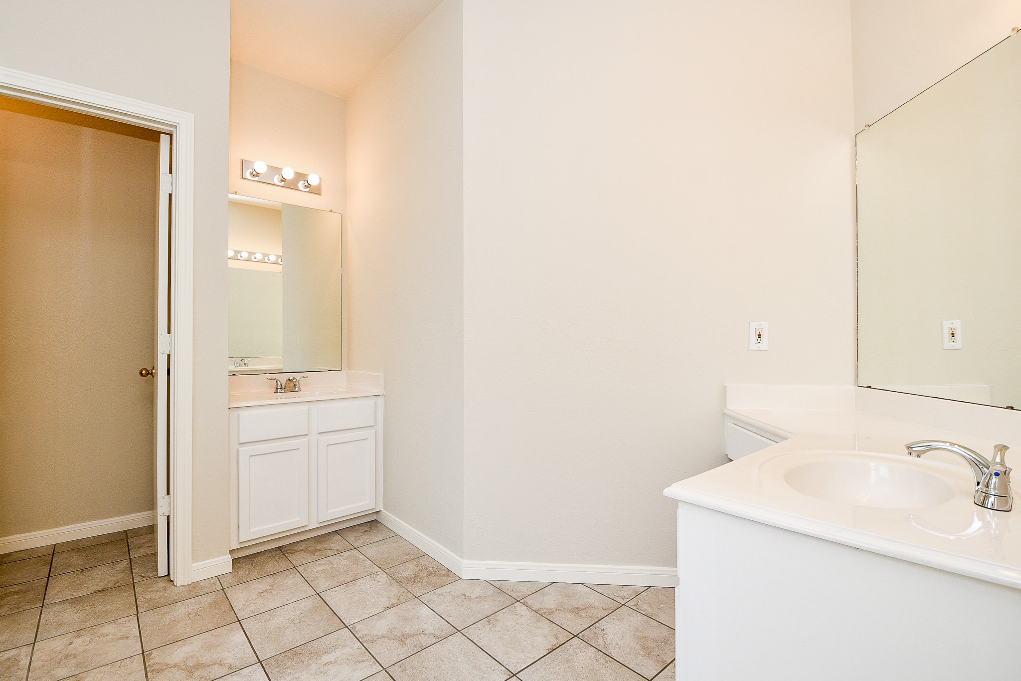 2707 Silk Tree Lane Katy, TX 77449 - Photo 21 of 31 a bathroom with a sink a toilet and mirror