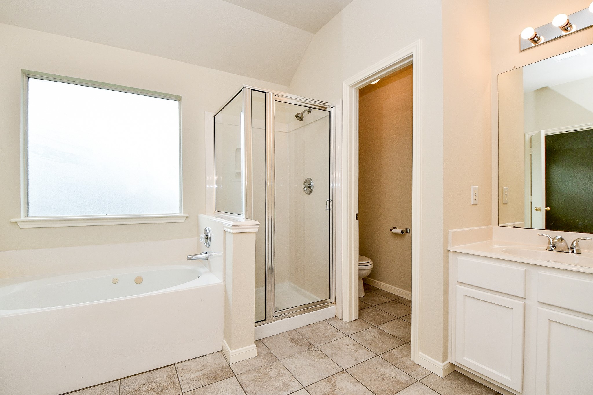 2707 Silk Tree Lane Katy, TX 77449 - Photo 23 of 33 a bathroom with a bathtub sink and toilet