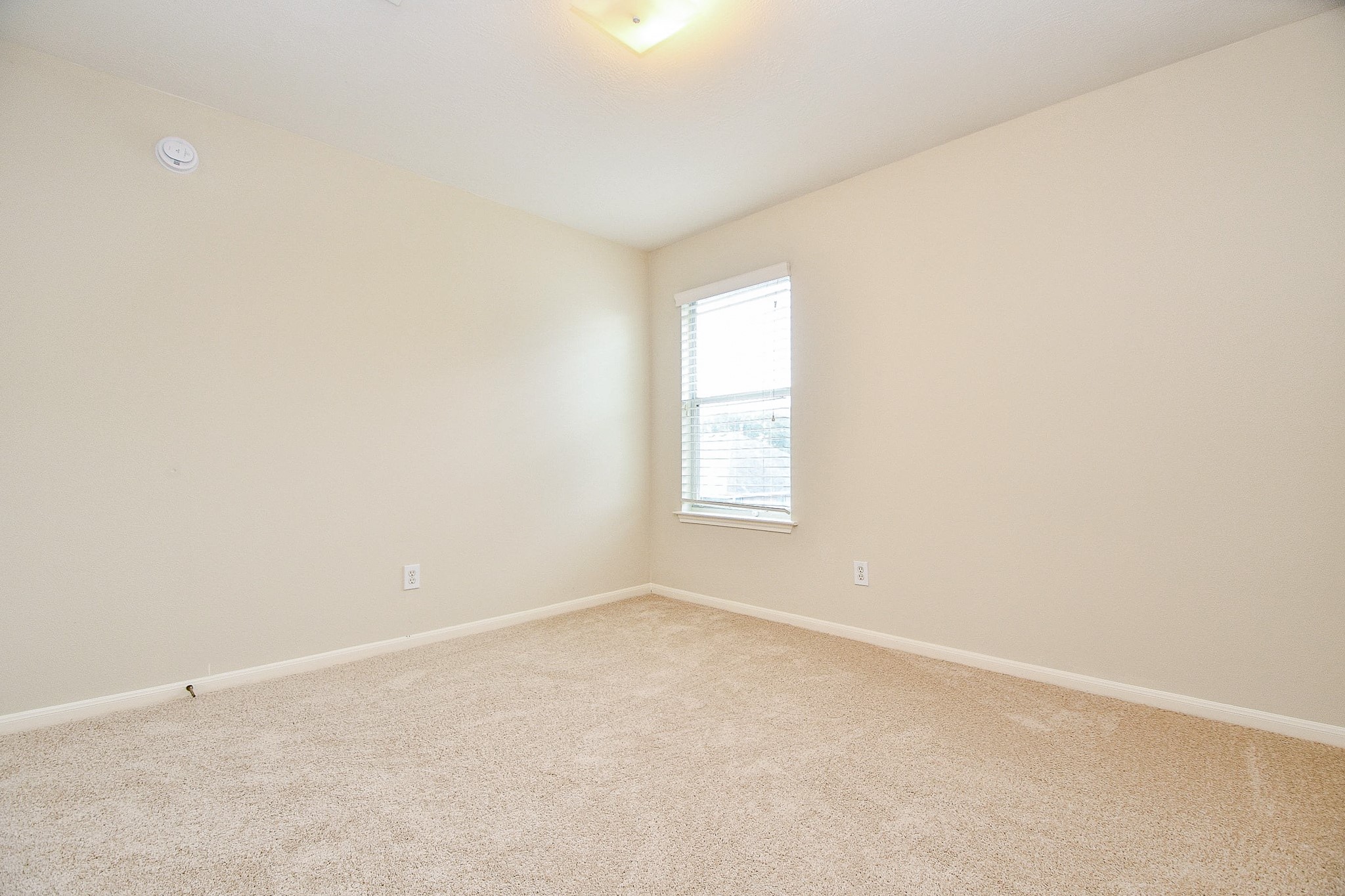 2707 Silk Tree Lane Katy, TX 77449 - Photo 24 of 33 an empty room with a window