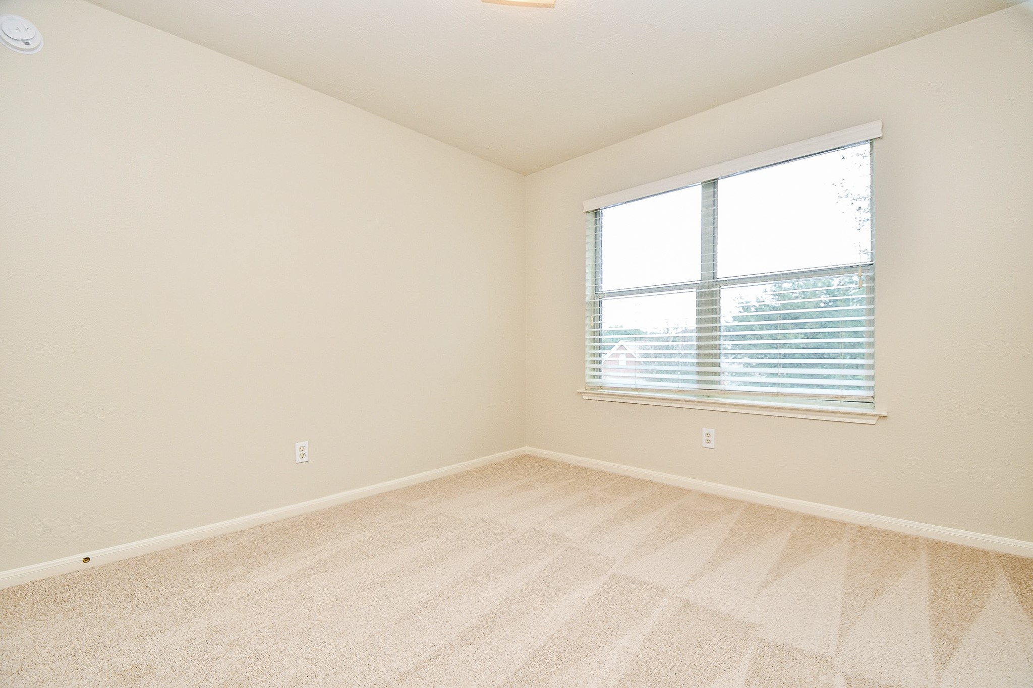 2707 Silk Tree Lane Katy, TX 77449 - Photo 25 of 31 an empty room with a window