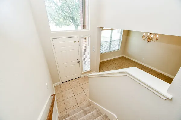 a bathroom with a sink a mirror and shower curtain