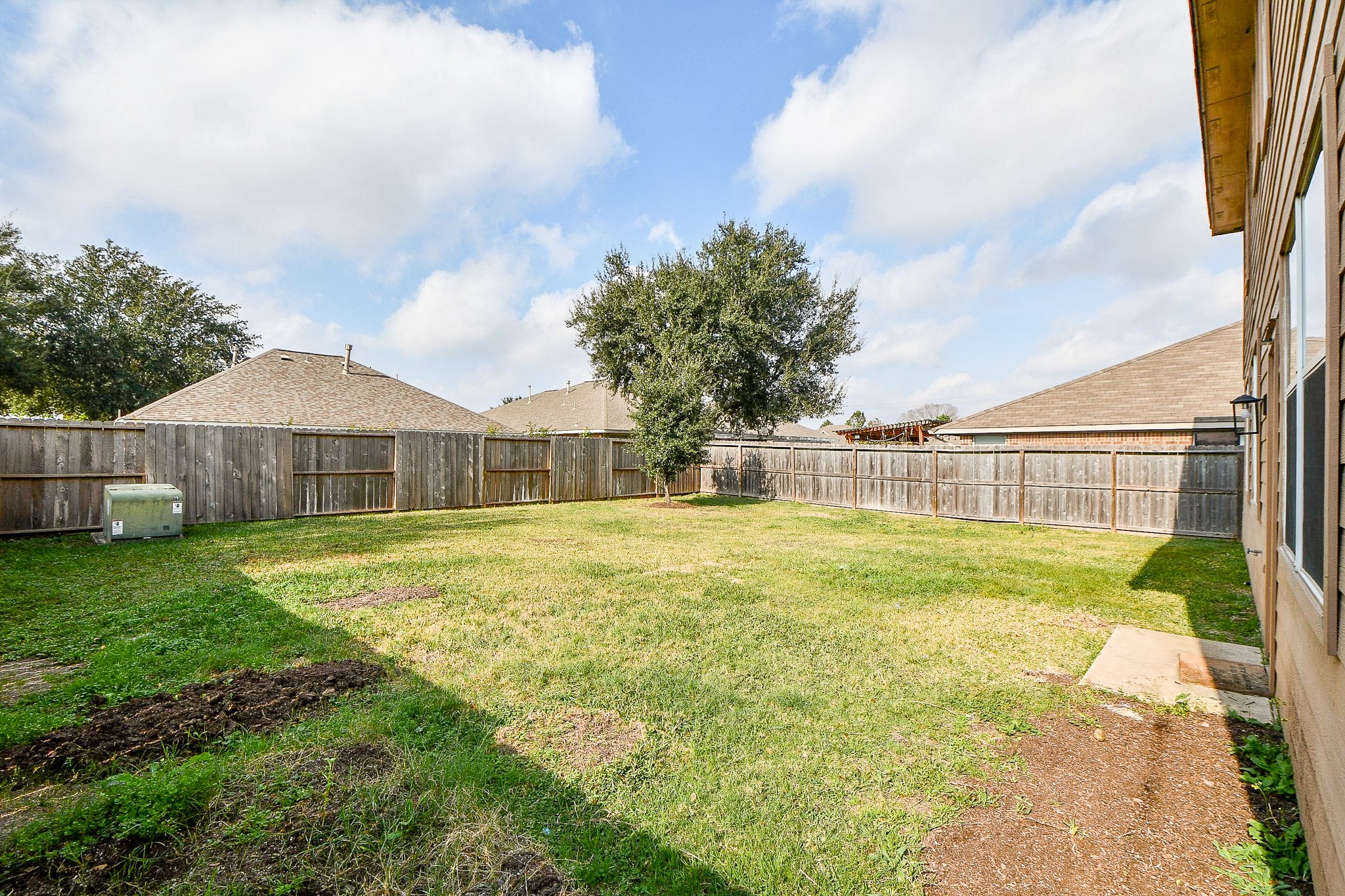 2707 Silk Tree Lane Katy, TX 77449 - Photo 31 of 33 a bathroom with swimming pool and trees in the background