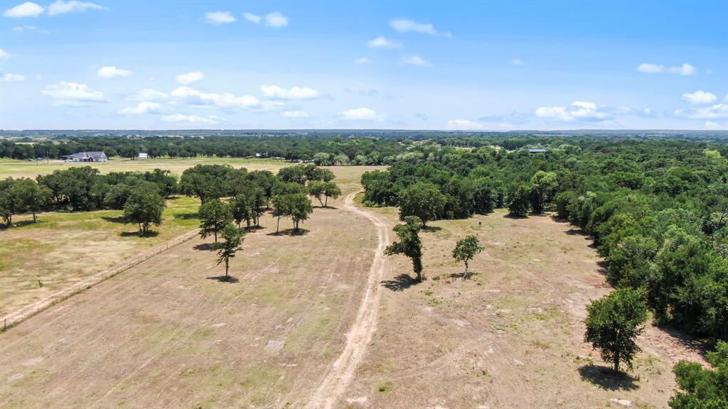 A Wilson Bend Road Millsap, TX 76066 - Photo 8 of 11 a view of a swimming pool with a yard