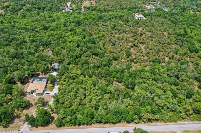 with view of a lush green field