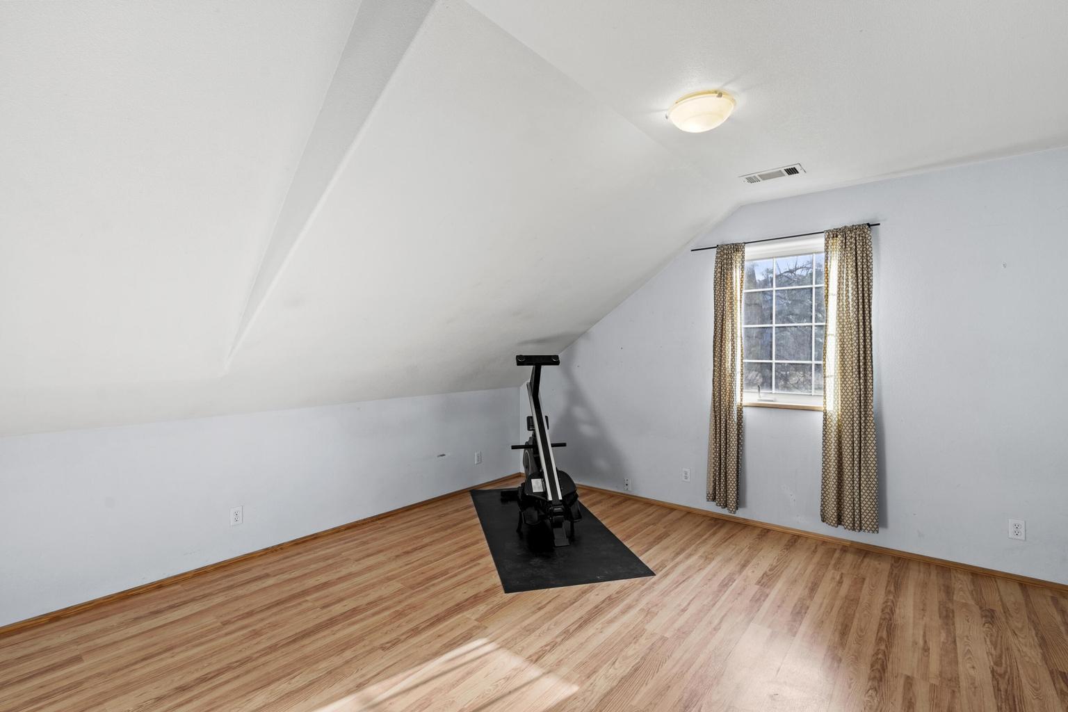 1190 Cedar Flat Road Williams, OR 97544 - Photo 17 of 45 a view of a room with wooden floor and a window