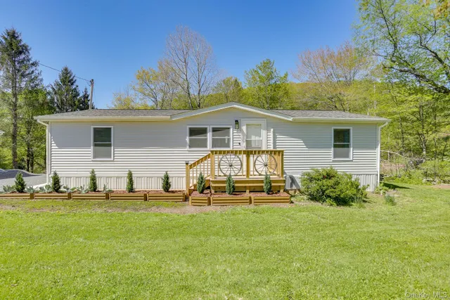 a front view of house with yard