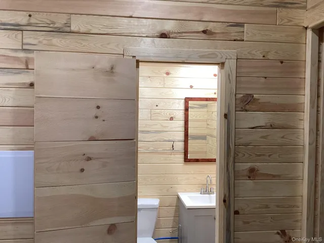 a view of a chairs and table in the patio