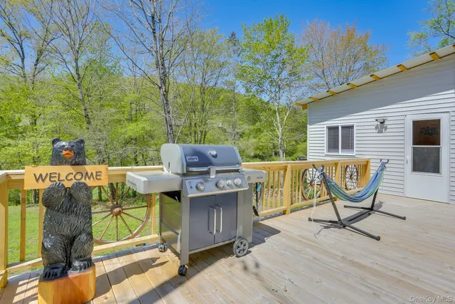 a view of balcony with deck and wooden floor