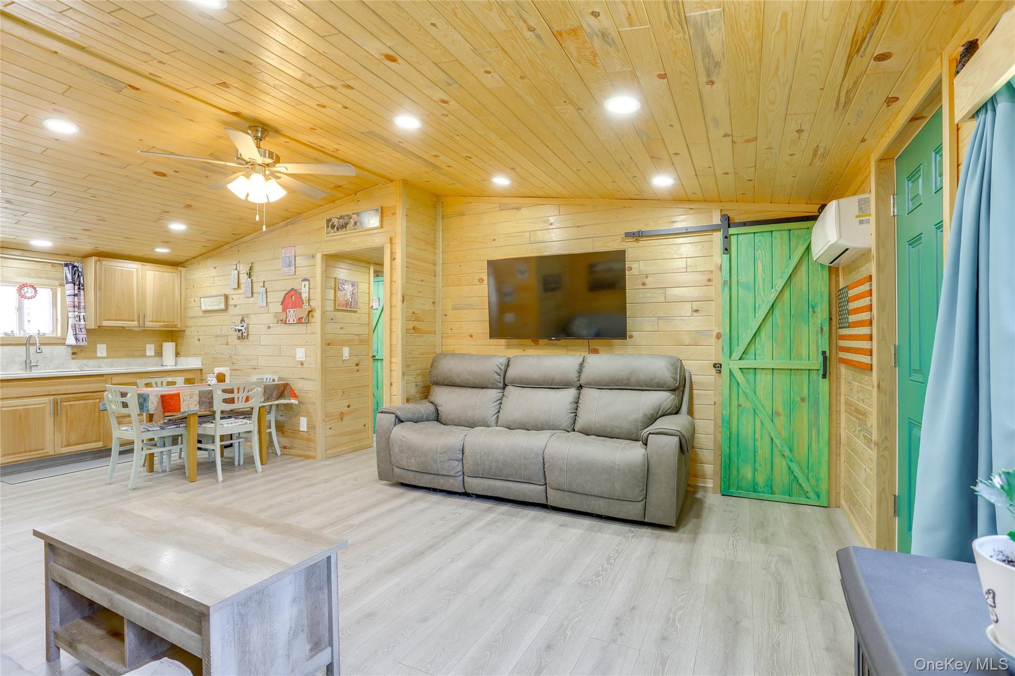 463 County Road 131 Callicoon, NY 12723 - Photo 6 of 29 a living room with furniture and a table