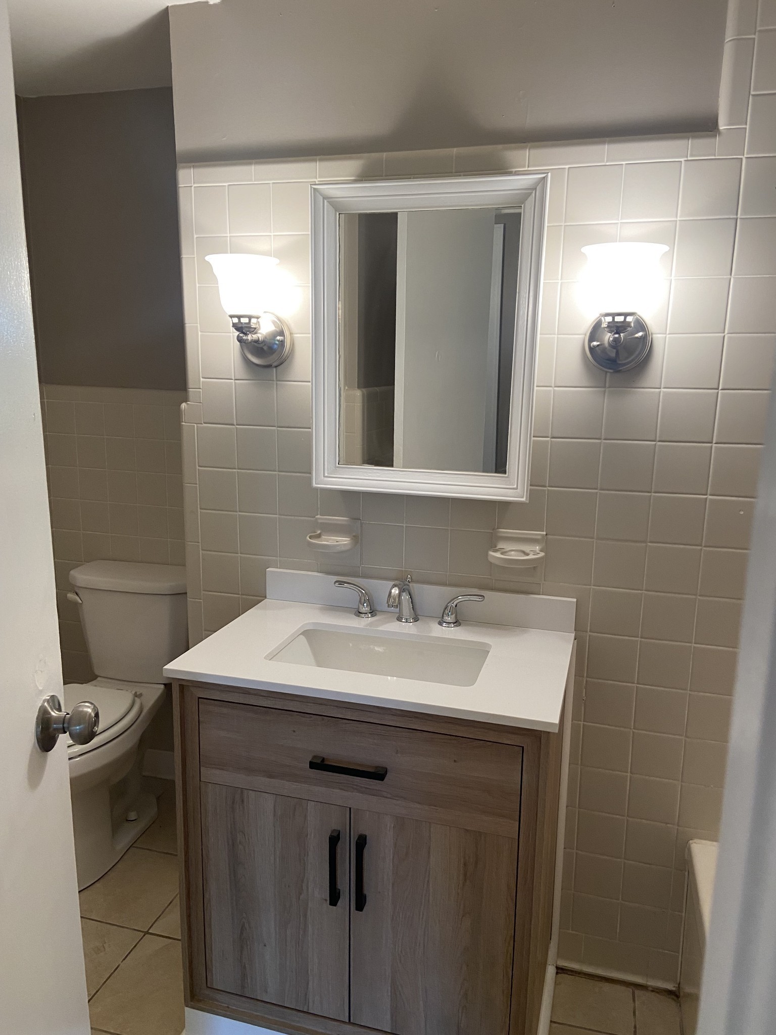 11495 Guthrie Road Guthrie, KY 42234 - Photo 21 of 43 a bathroom with a sink toilet and mirror