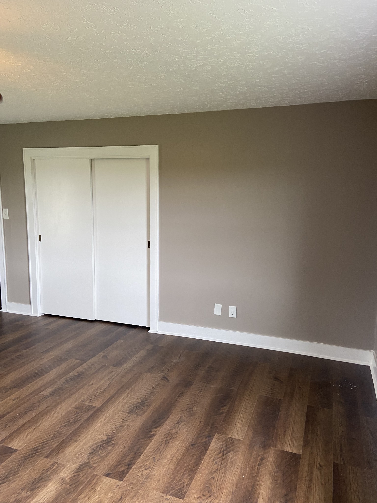 11495 Guthrie Road Guthrie, KY 42234 - Photo 36 of 43 a view of an empty room with wooden floor