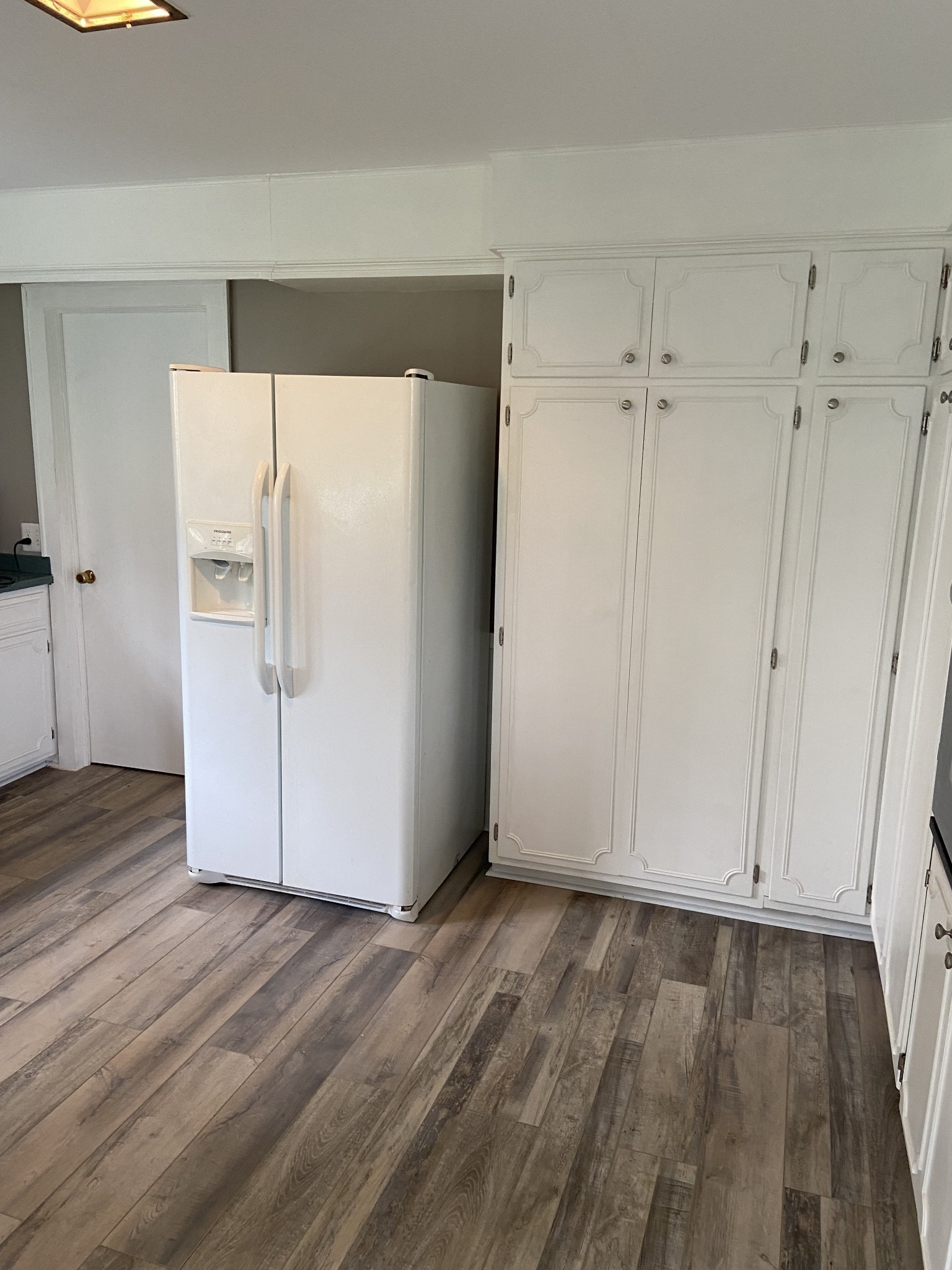 11495 Guthrie Road Guthrie, KY 42234 - Photo 38 of 43 a view of cabinets and wooden floor
