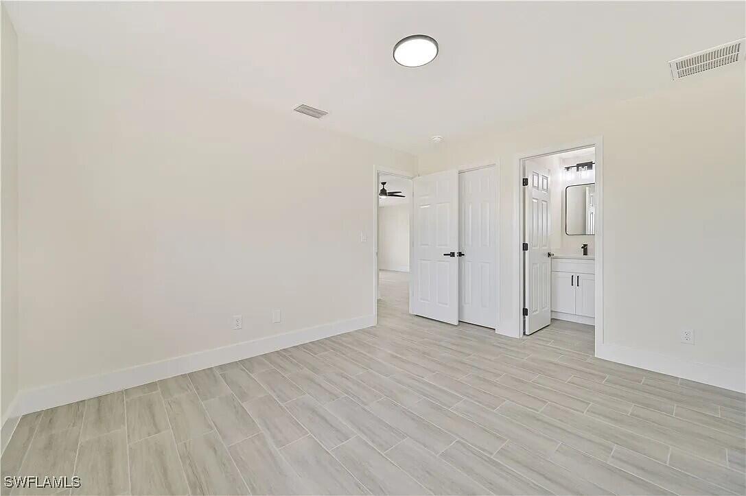 4733 28th Street Southwest Lehigh Acres, FL 33973 - Photo 6 of 10 Living Room 4