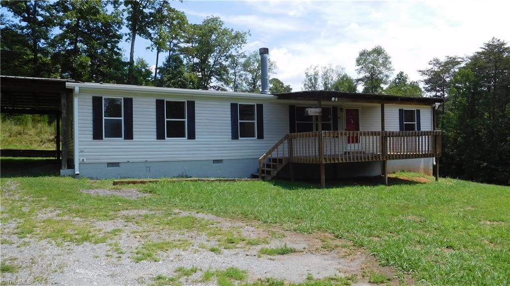 1334 White Rock Road Pinnacle, NC 27043 - Photo 1 of 27 Very Secluded Home with tons of storage.
