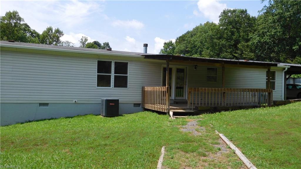 1334 White Rock Road Pinnacle, NC 27043 - Photo 11 of 27 Exterior Back. Covered back porch.