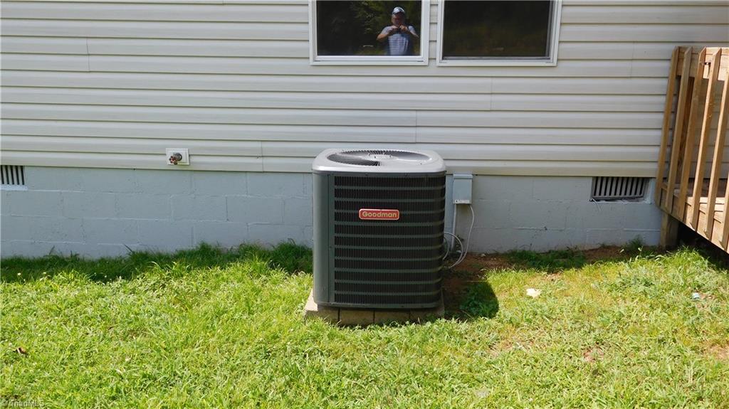 1334 White Rock Road Pinnacle, NC 27043 - Photo 20 of 27 Back of home. New Heat Pump.