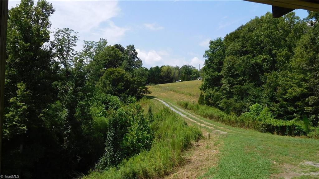 1334 White Rock Road Pinnacle, NC 27043 - Photo 24 of 27 Long driveway. Home sits off of home, very quiet.