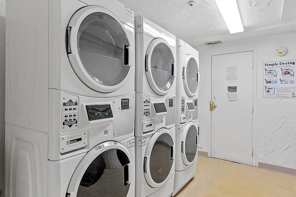3 Pembroke Drive, Unit 5 Derry, NH 03038 - Photo 8 of 15 a utility room with dryer and washer