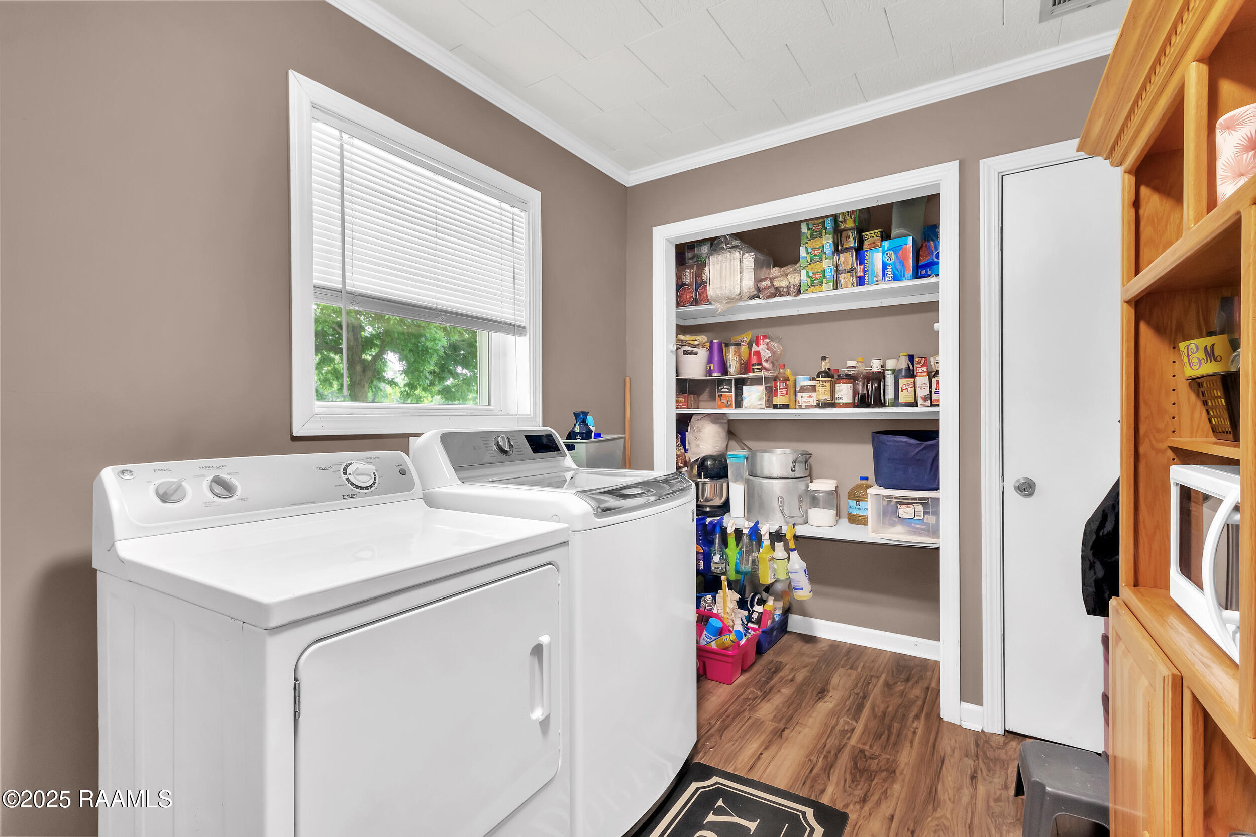 209 Alva Road Youngsville, LA 70592 - Photo 9 of 33 Laundry plus Pantry Storage