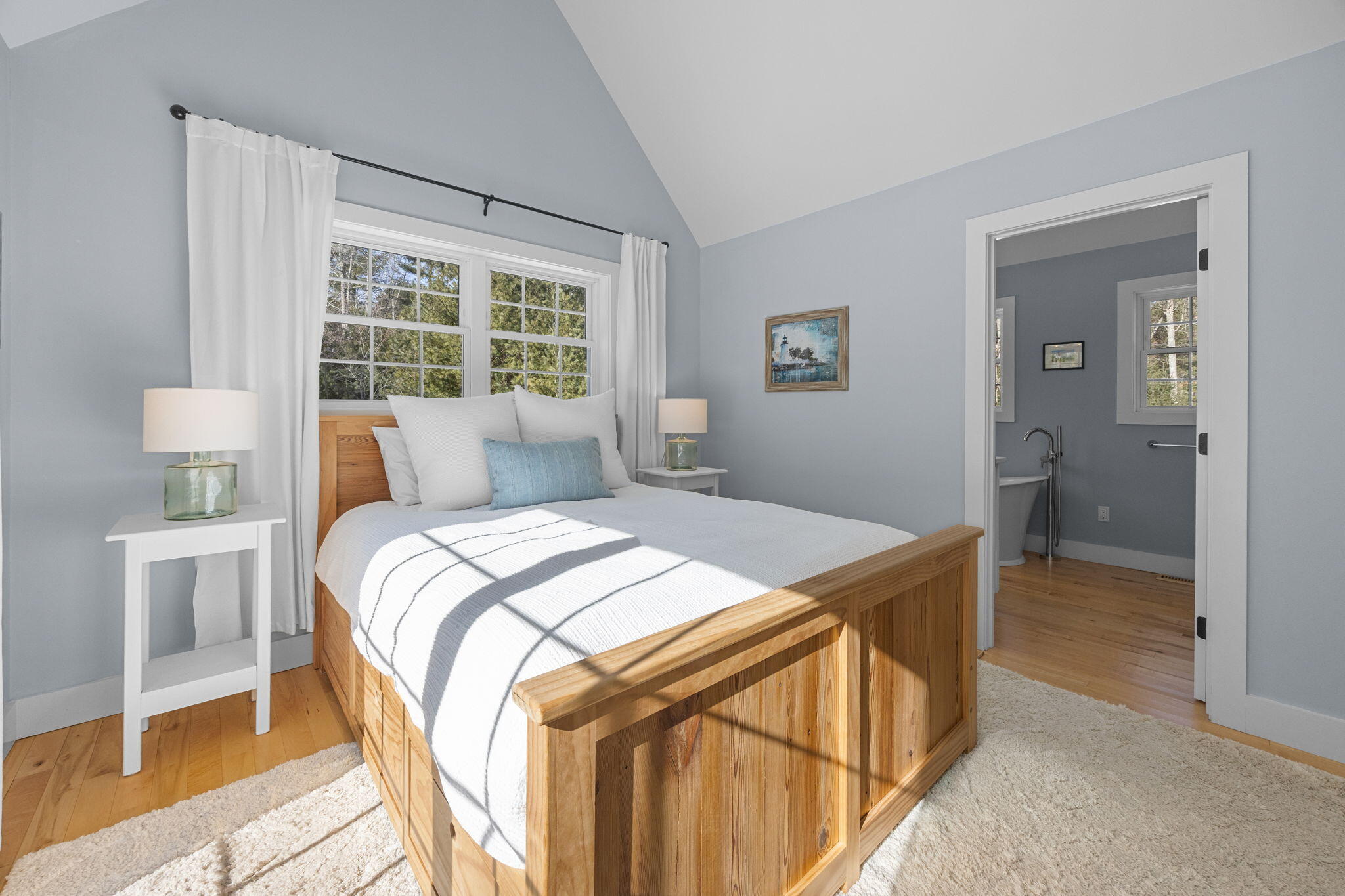 174 Cross Neck Road Marion, MA 02738 - Photo 20 of 41 a bedroom with a bed and a large window