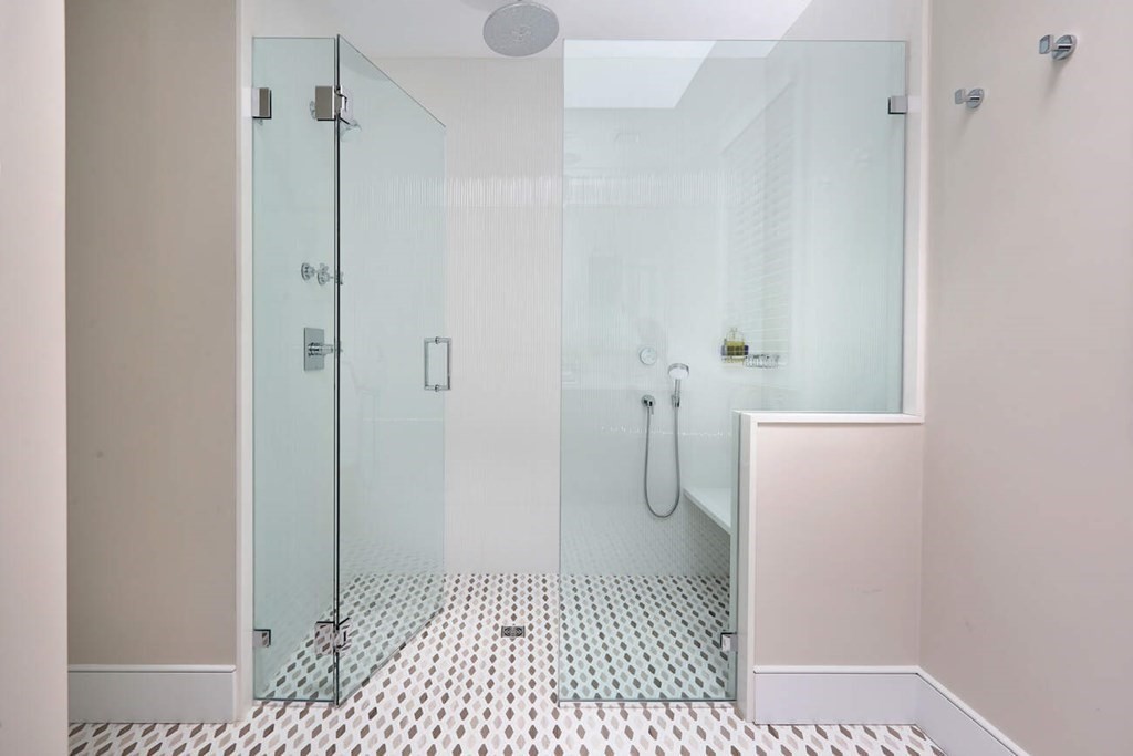 10 Doris Circle Newton, MA 02458 - Photo 12 of 21 a bathroom with a sink a shower and a toilet