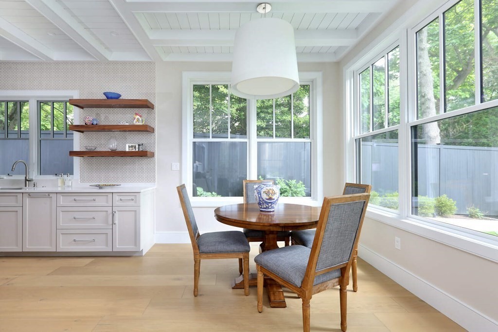 10 Doris Circle Newton, MA 02458 - Photo 6 of 21 a dining room with furniture and a large window