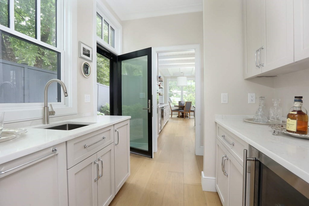 10 Doris Circle Newton, MA 02458 - Photo 8 of 21 a kitchen with sink and cabinets