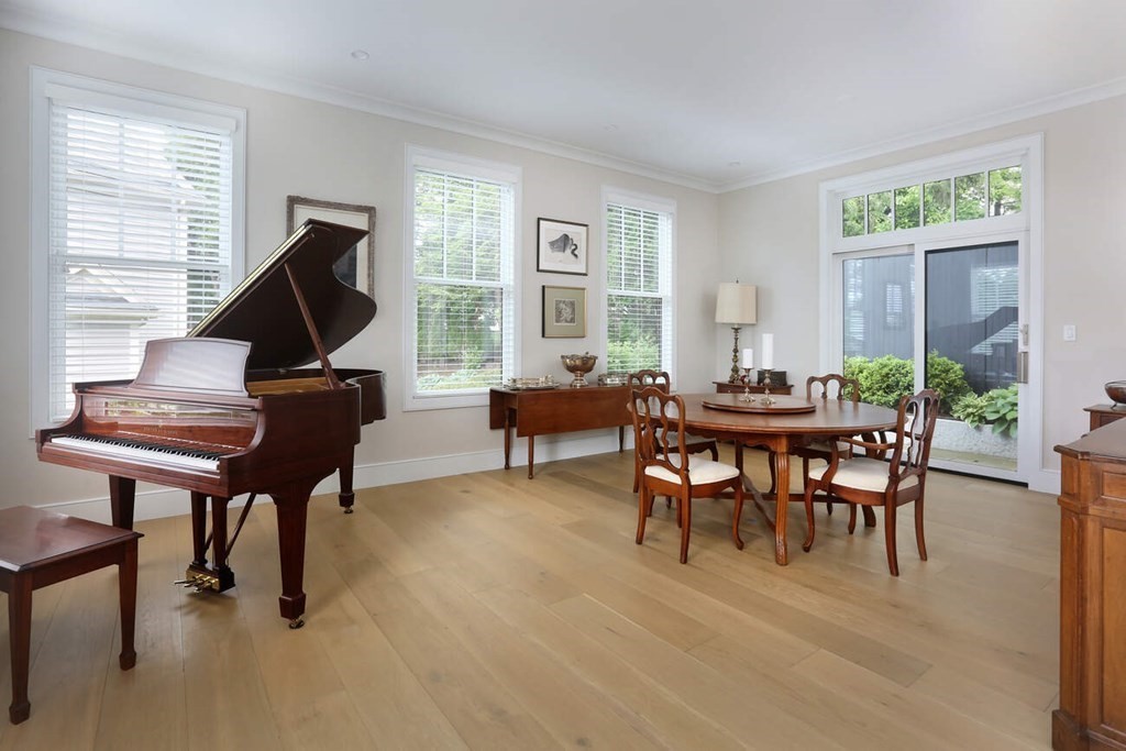 10 Doris Circle Newton, MA 02458 - Photo 9 of 21 a living room with furniture a rug and a large window