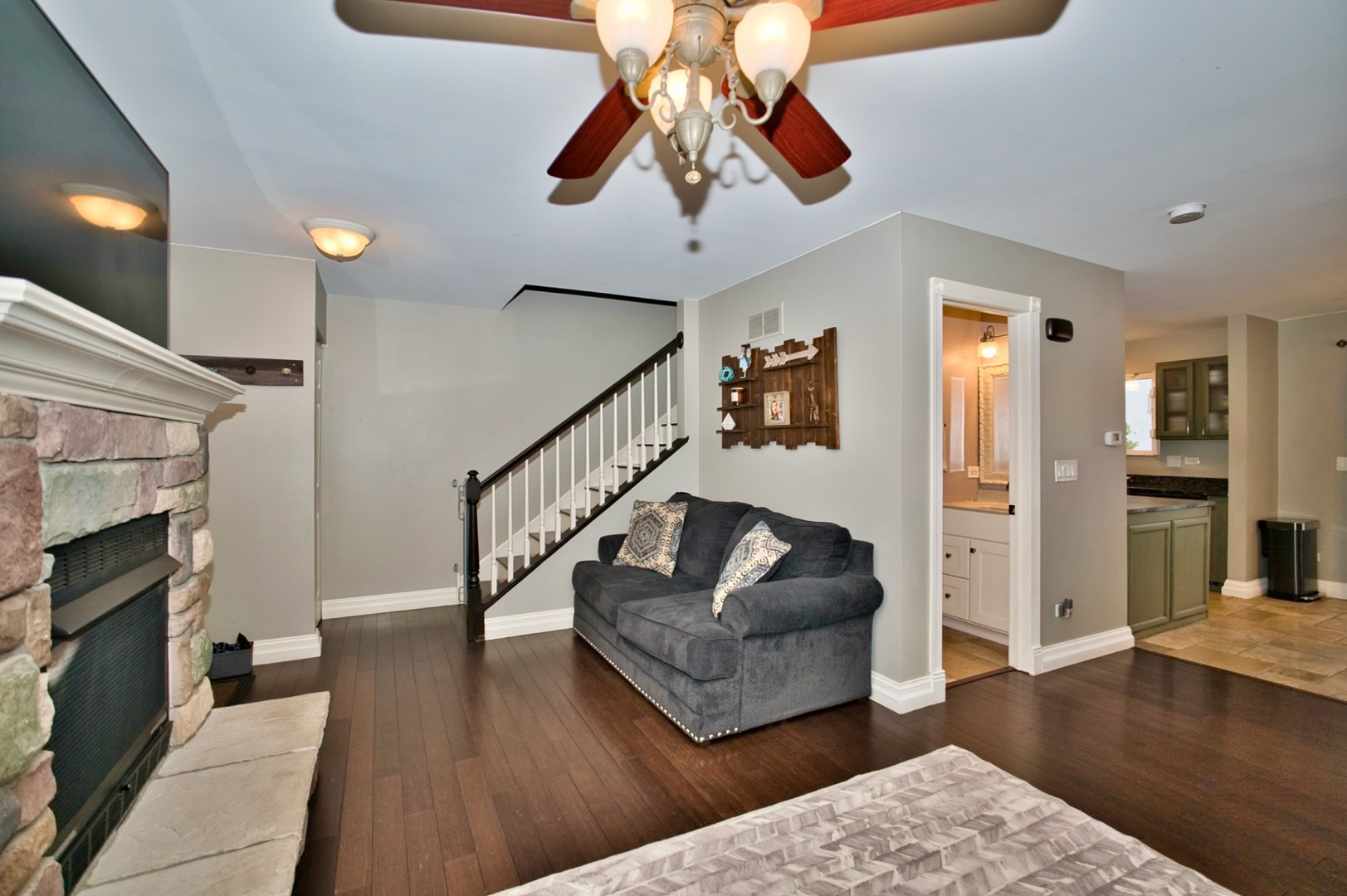 6313 Colton Ridge Court Plainfield, IL 60586 - Photo 3 of 57 a living room with furniture and a fireplace