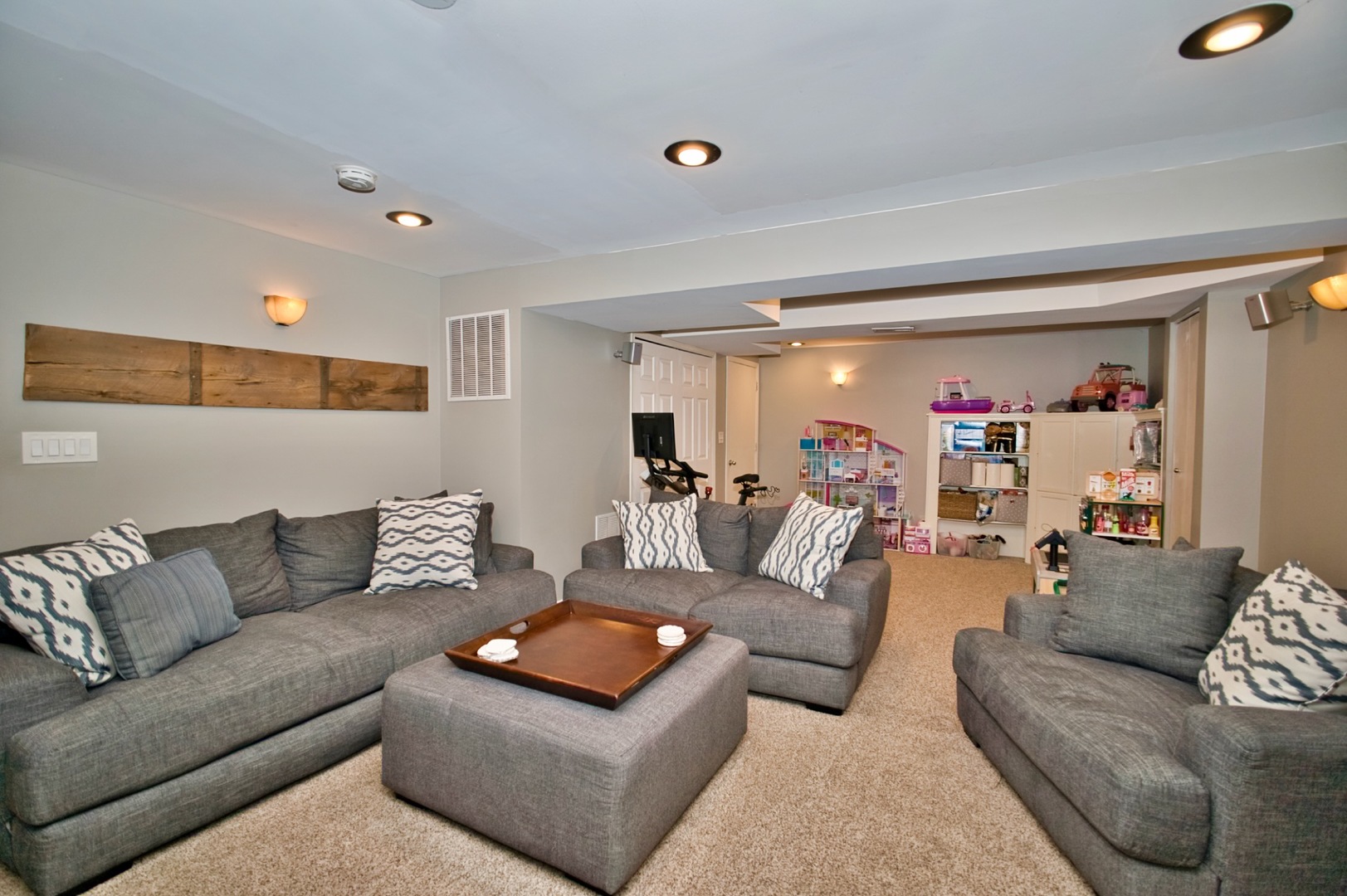 6313 Colton Ridge Court Plainfield, IL 60586 - Photo 42 of 57 a living room with furniture and a wooden floor
