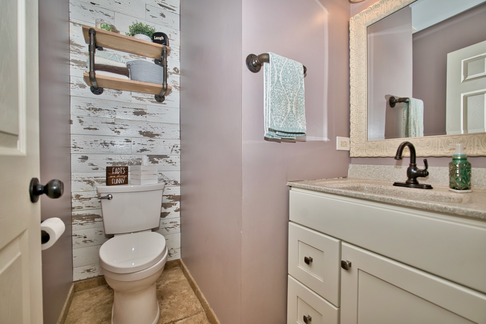 6313 Colton Ridge Court Plainfield, IL 60586 - Photo 6 of 57 a bathroom with a toilet a sink and mirror