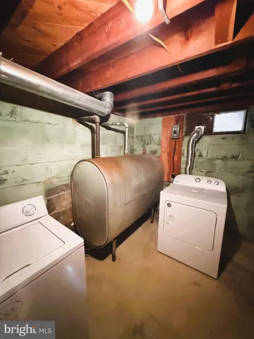 a room with furniture and a window