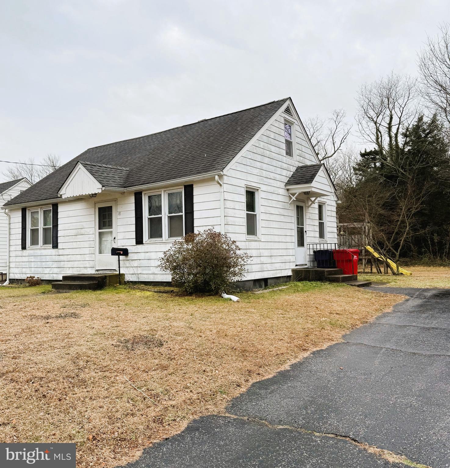 18 Cornell Avenue Bridgeton, NJ 08302 - Photo 2 of 20 a view of a house with swimming pool and sitting area