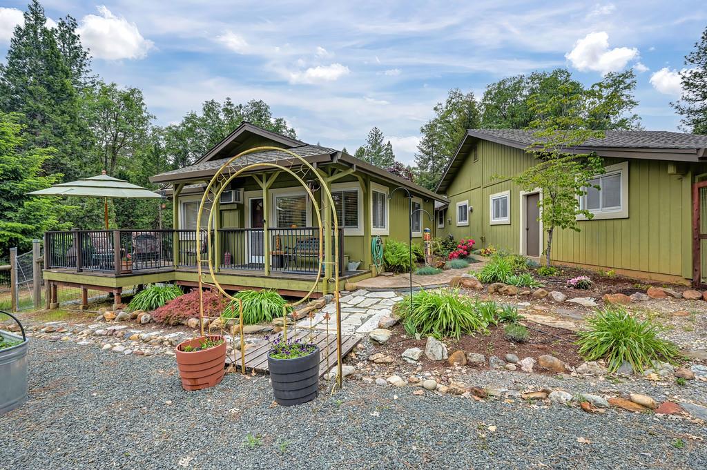 29082 Ridge View Road Foresthill, CA 95631 - Photo 47 of 78 a front view of a house with porch and garden