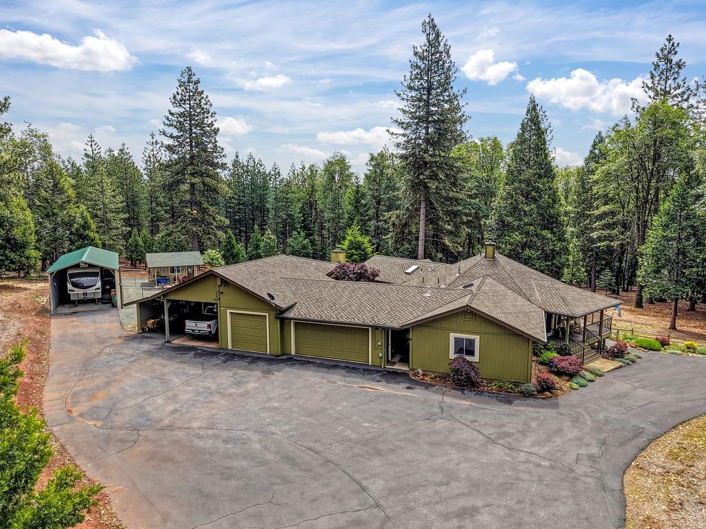 29082 Ridge View Road Foresthill, CA 95631 - Photo 67 of 78 a view of a house with a yard and roof