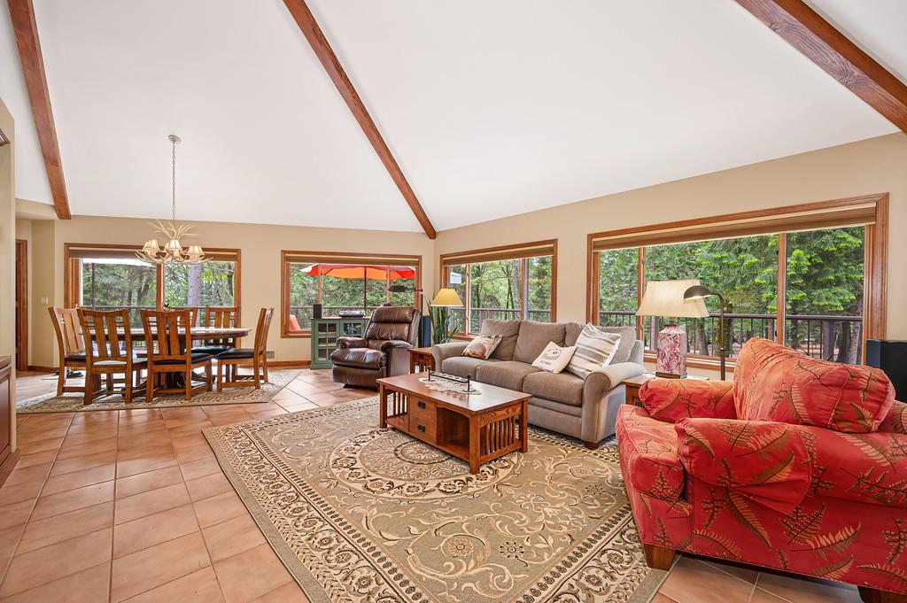 29082 Ridge View Road Foresthill, CA 95631 - Photo 9 of 78 a living room with furniture and large windows