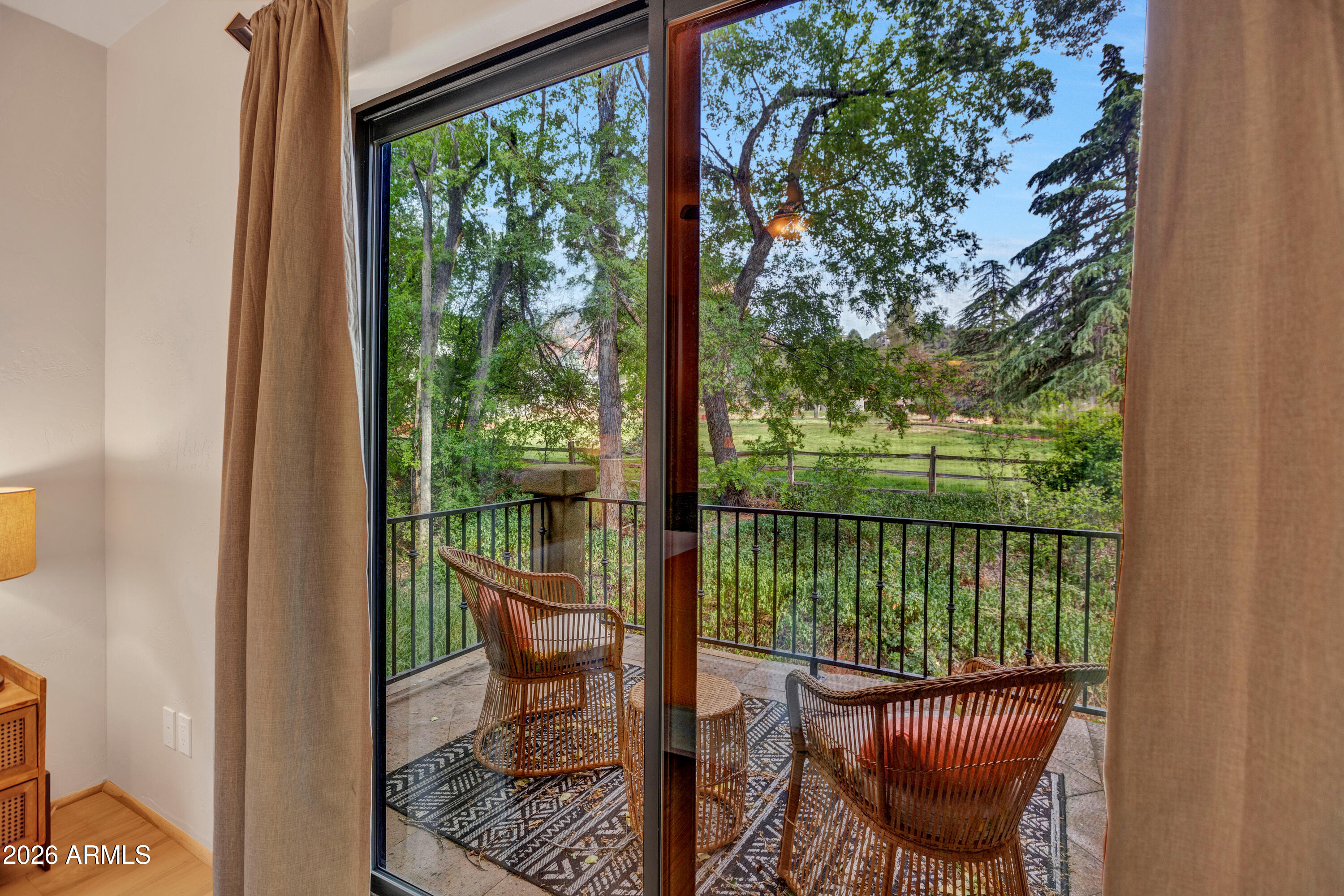 55 Ranch House Circle Sedona, AZ 86336 - Photo 23 of 61 a view of a chair and table in the balcony
