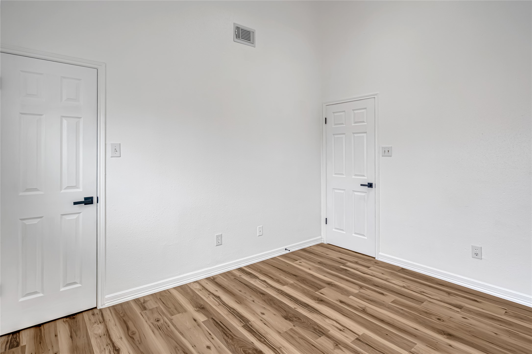 12426 North Rachlin Circle Houston, TX 77071 - Photo 11 of 31 a view of a room with wooden floor