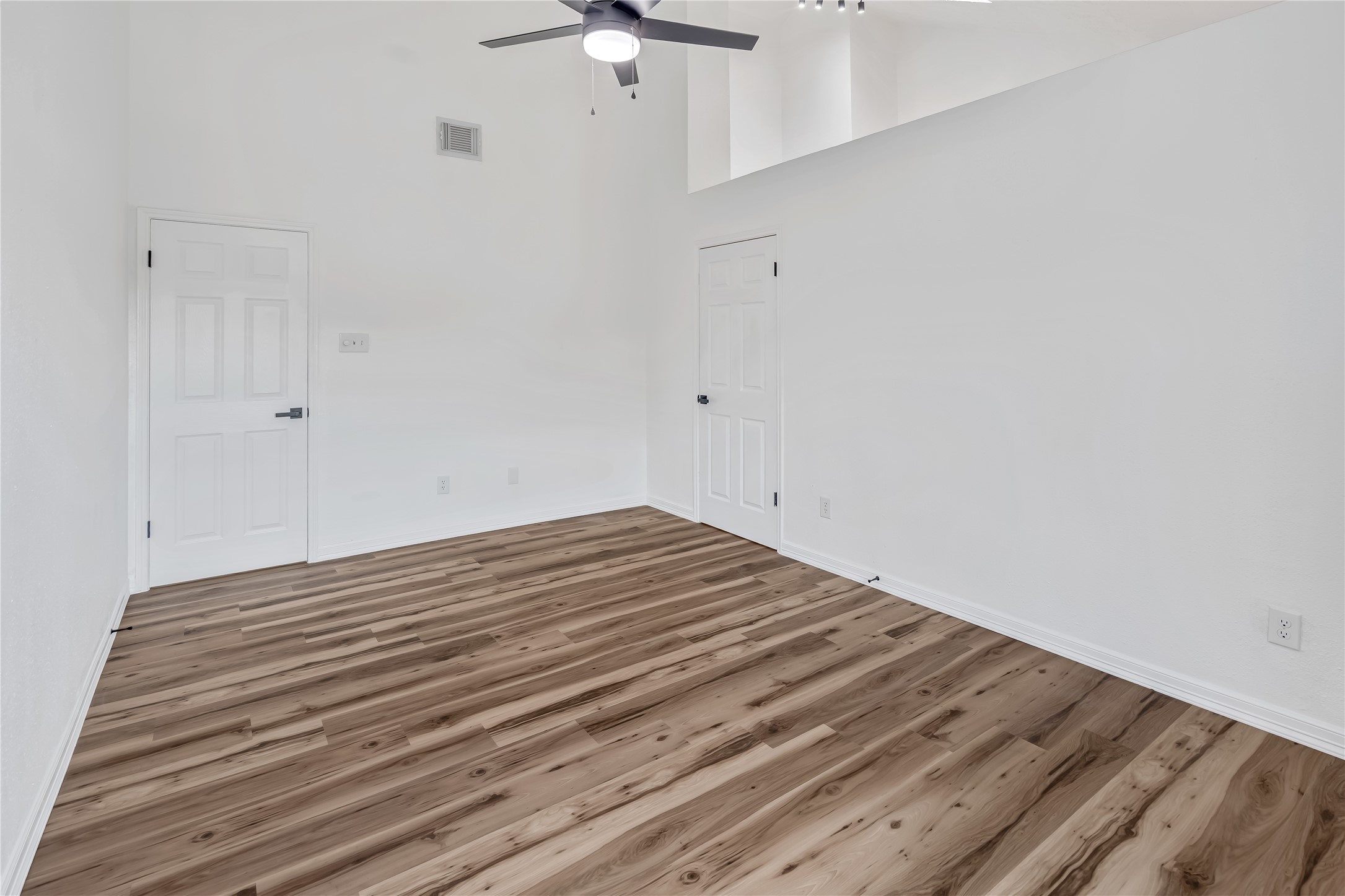 12426 North Rachlin Circle Houston, TX 77071 - Photo 13 of 31 a view of a room with wooden floor