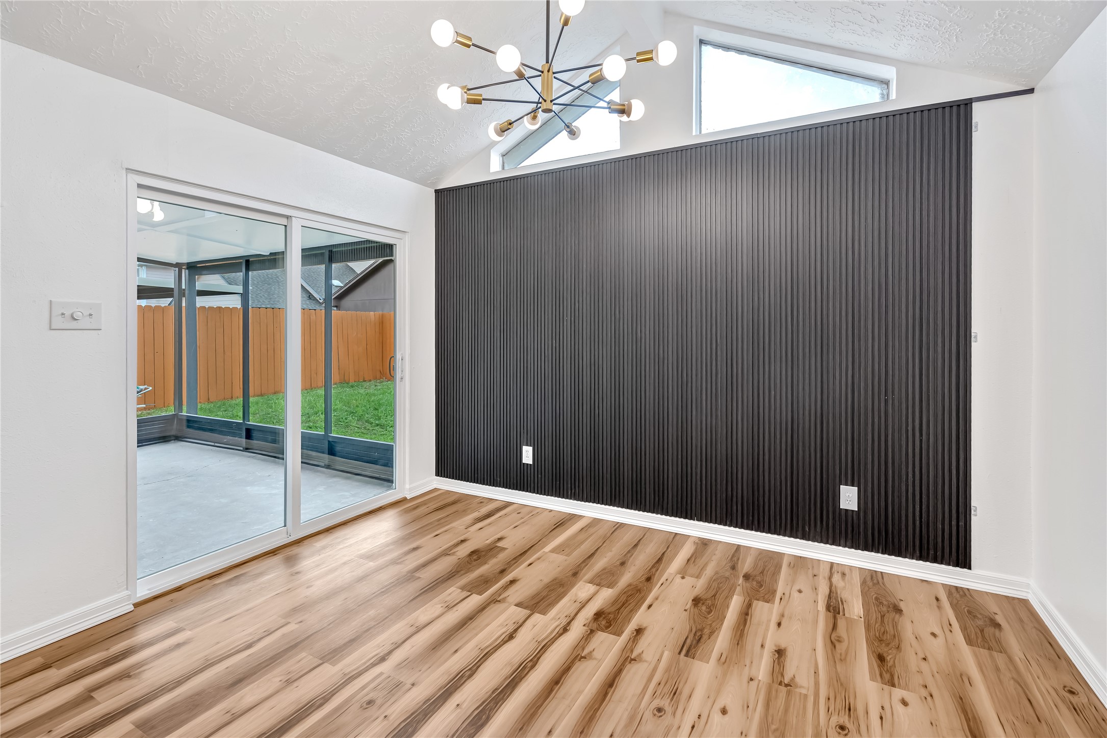 12426 North Rachlin Circle Houston, TX 77071 - Photo 30 of 31 wooden floor in an empty room with a window