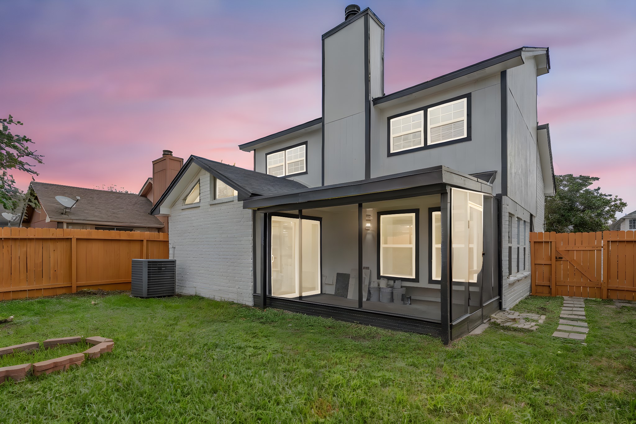 12426 North Rachlin Circle Houston, TX 77071 - Photo 3 of 31 a front view of a house with a yard