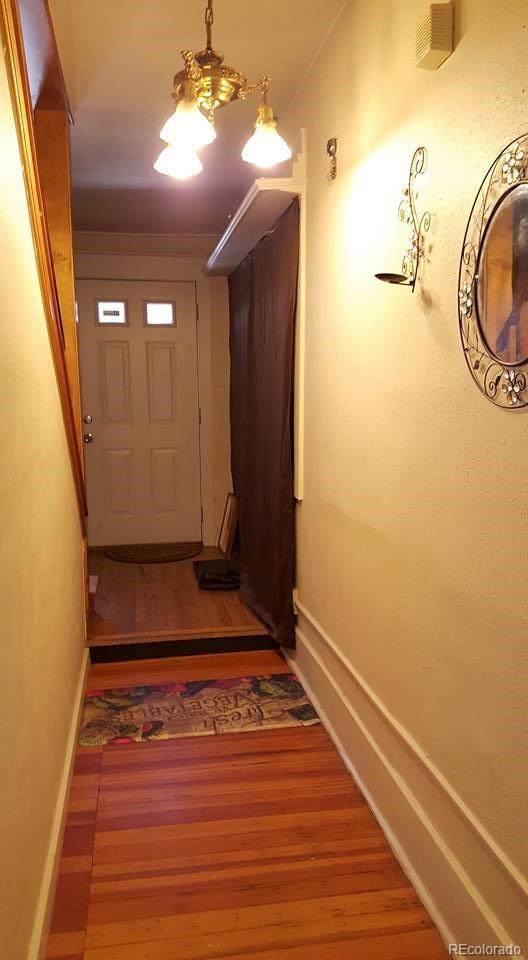 44 Lincoln Street Denver, CO 80203 - Photo 24 of 35 a view of a entryway door with wooden floor
