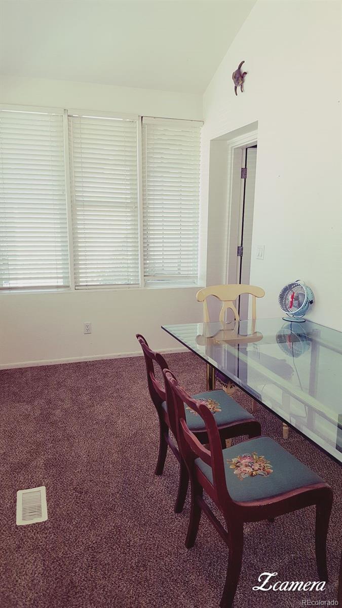 44 Lincoln Street Denver, CO 80203 - Photo 10 of 35 a room with a table and chairs